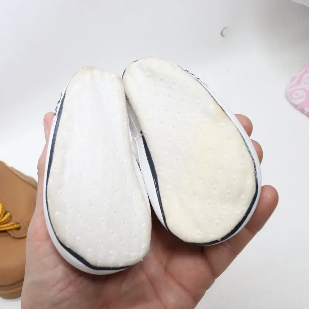 Boots pair sneakers